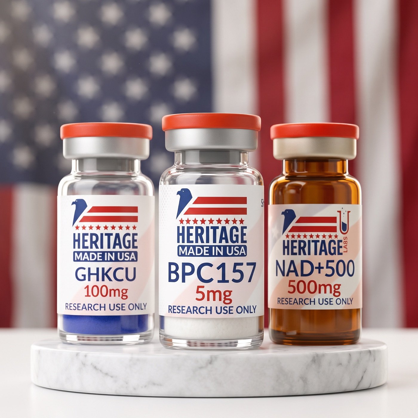 Heritage Labs GHK-Cu, BPC-157 and NAD+ research vials on marble against the American flag